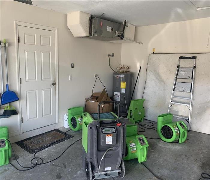 Drying equpiment setup in the garage of a house