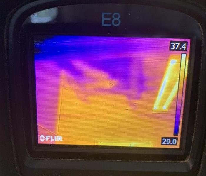 Thermal imaging camera checking for moisture