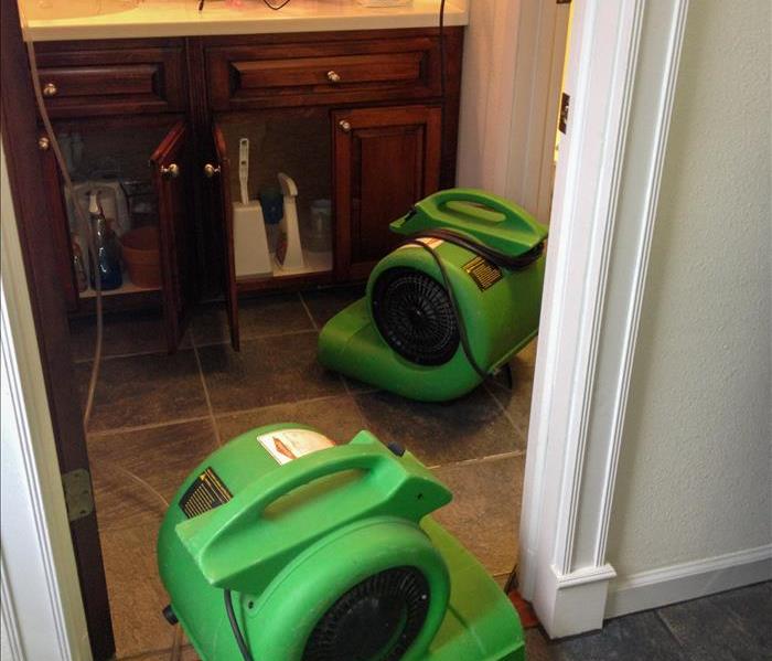 Drying equipment set up in the bathroom of a Lakeland, FL home.