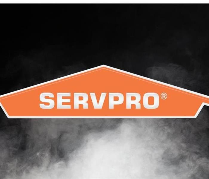 Smoke with Large fonts saying SERVPRO
