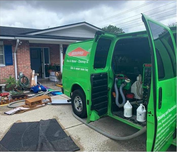 Servpro van arrived to a house to perform water restoration services